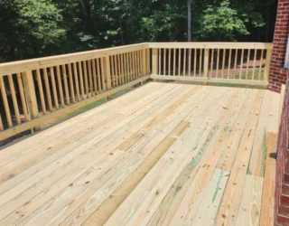 deck with wooden railing